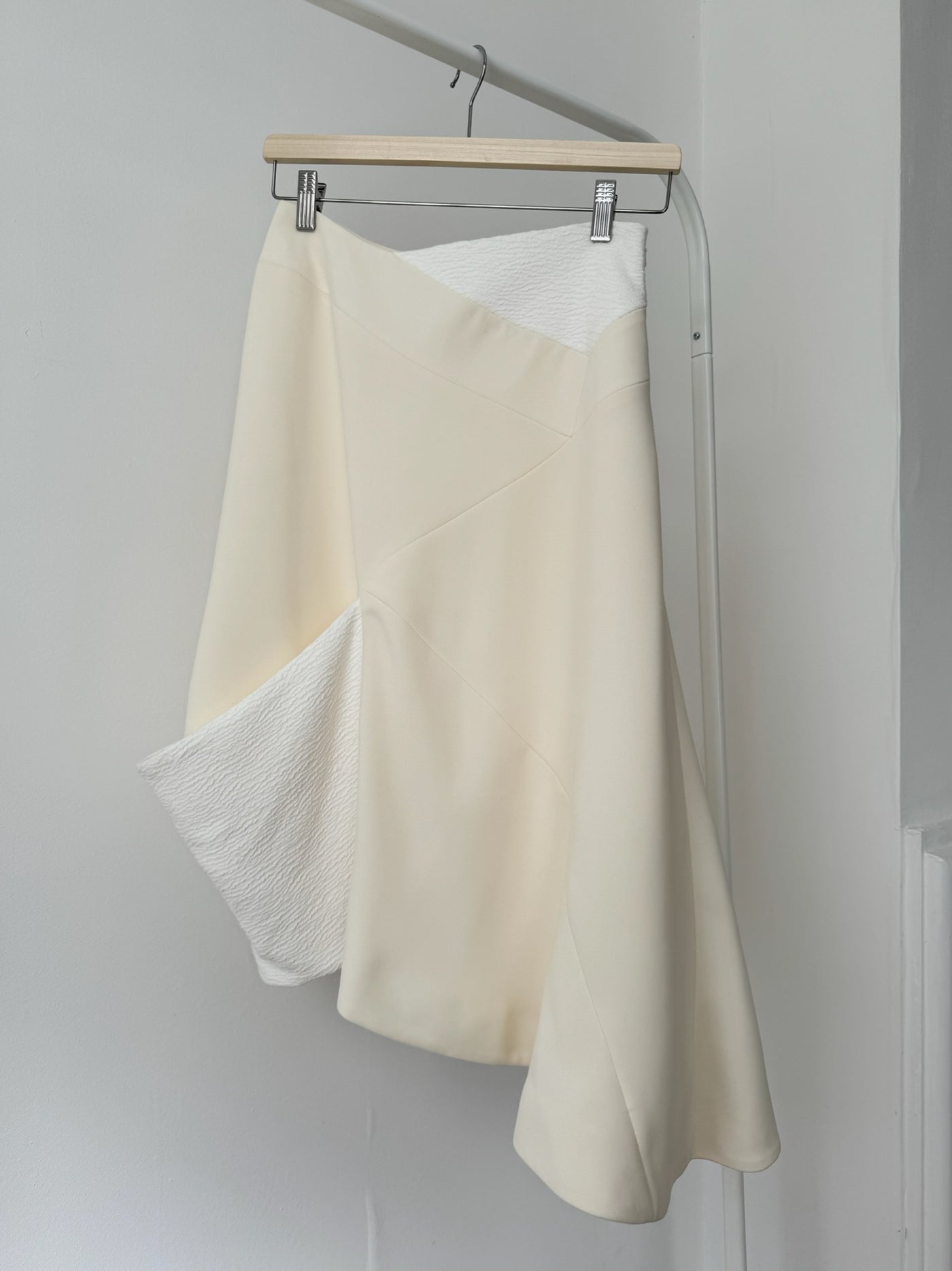 Cream JW Anderson panelled skirt with textured white inserts, front view